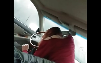 Horny Action In The Car: Japanese Couple's Steamy Fun!