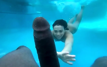 Witness the Rise of the Aquatic Queen: Teen MILF Surrenders to Massive BBC